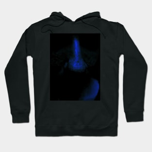 Portrait, digital collage and special processing. Close up to face, nose. Weird and dark. Very dim, blue. Hoodie